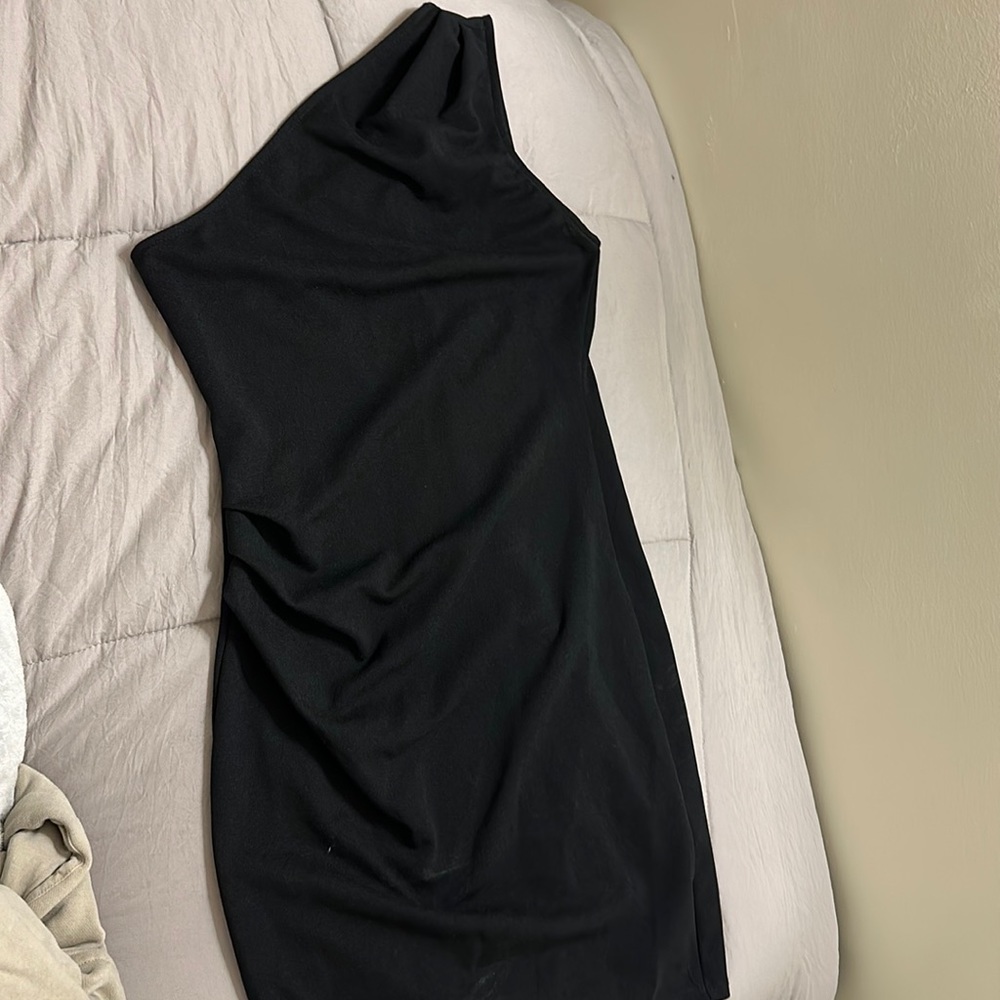 Black, semi thin, one shoulder dress.